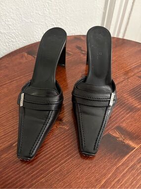 CHANEL Black Pointed Leather Mule Slides with Logo Plaque